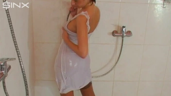 Brunette In White Dress Seductively Showers Screencap 29 on sinx.preview.netperv.com