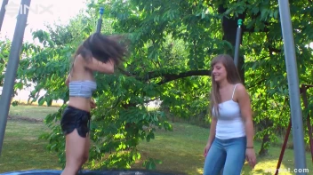 Cute Brunettes Get Drenched On Trampoline Screencap 9 on sinx.preview.netperv.com