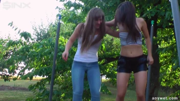 Cute Brunettes Get Drenched On Trampoline Screencap 15 on sinx.preview.netperv.com