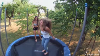 Cute Brunettes Get Drenched On Trampoline Screencap 18 on sinx.preview.netperv.com