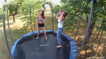 Cute Brunettes Get Drenched On Trampoline Screencap 30 on sinx.preview.netperv.com