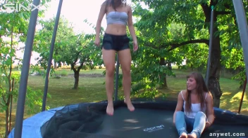 Cute Brunettes Get Drenched On Trampoline Screencap 36 on sinx.preview.netperv.com