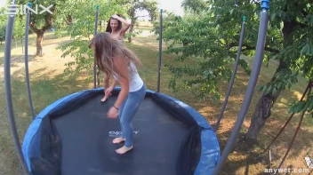 Cute Brunettes Get Drenched On Trampoline Screencap 4 on sinx.preview.netperv.com