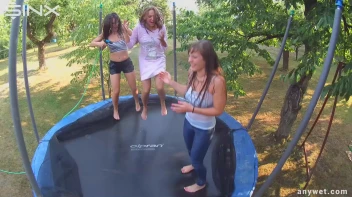 Cute Brunettes Get Drenched On Trampoline Screencap 46 on sinx.preview.netperv.com