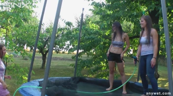 Cute Brunettes Get Drenched On Trampoline Screencap 53 on sinx.preview.netperv.com