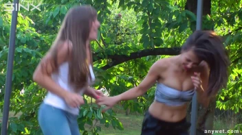 Cute Brunettes Get Drenched On Trampoline Screencap 6 on sinx.preview.netperv.com