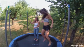 Cute Brunettes Get Drenched On Trampoline Screencap 7 on sinx.preview.netperv.com