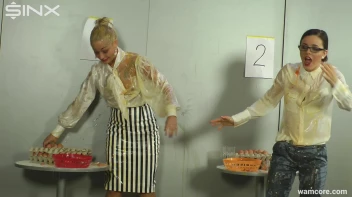 Playful businesswomen cover each other in raw egg Screencap 22 on sinx.preview.netperv.com