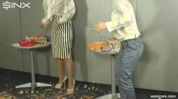 Playful businesswomen cover each other in raw egg Screencap 8 on sinx.preview.netperv.com