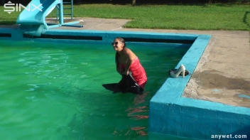 Waterpark Fun For Fully Clothed Brunette Babe Screencap 38 on sinx.preview.netperv.com