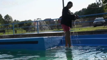 Waterpark Fun For Fully Clothed Brunette Babe Screencap 8 on sinx.preview.netperv.com