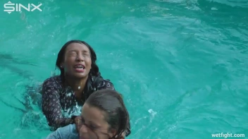 Three wild girls in pool cat fight Screencap 15 on sinx.preview.netperv.com