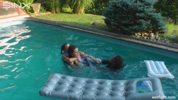 Three wild girls in pool cat fight Screencap 39 on sinx.preview.netperv.com