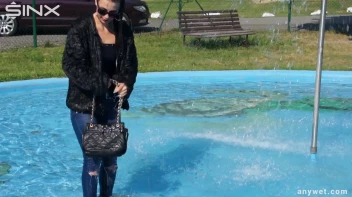 Raven Haired Hottie Soaks Herself At Waterpark Screencap 24 on sinx.preview.netperv.com