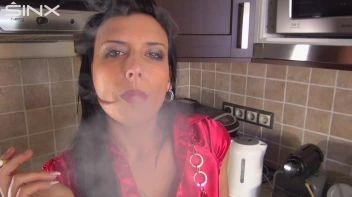 Raven Haired Hottie Smokes In The Kitchen Screencap 28 on sinx.preview.netperv.com