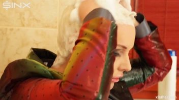 Clothed Sexy Blonde Lathers Up Her Hair Screencap 21 on sinx.preview.netperv.com