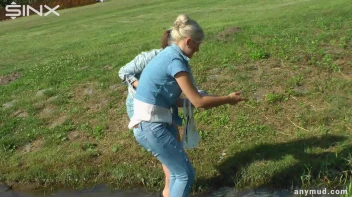 Hot Babes Catfight In Muddy Stream Screencap 11 on sinx.preview.netperv.com