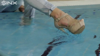 Fully Clothed Swimming For High Heeled Babe Screencap 10 on sinx.preview.netperv.com