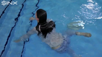 Fully Clothed Swimming For High Heeled Babe Screencap 55 on sinx.preview.netperv.com