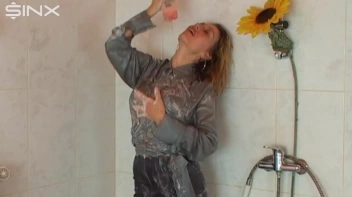 Busty Blonde Lathers Up In Clothed Shower Screencap 47 on sinx.preview.netperv.com