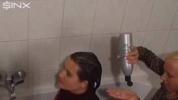 Clothed Ladies Wash Hair In Bath Together Screencap 37 on sinx.preview.netperv.com