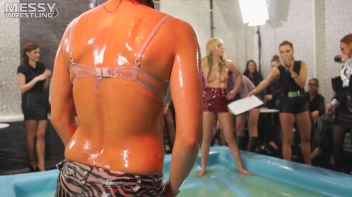 Messy Wrestling:  Roughin' It Up In The Oil Till They're Shredded Down To The Panties! Regular Footage!!! Screencap 60 on sinx.preview.netperv.com