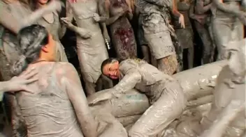 Two Dozen Babes Cheer On The Mud Fight Screencap 92 on sinx.preview.netperv.com