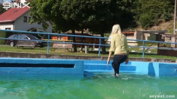 Sexy Blonde Swims And Splashes In Outdoor Pool Screencap 14 on sinx.preview.netperv.com