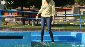 Sexy Blonde Swims And Splashes In Outdoor Pool Screencap 2 on sinx.preview.netperv.com