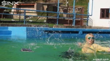 Sexy Blonde Swims And Splashes In Outdoor Pool Screencap 27 on sinx.preview.netperv.com