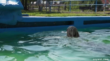 Sexy Blonde Swims And Splashes In Outdoor Pool Screencap 30 on sinx.preview.netperv.com