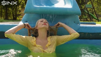 Sexy Blonde Swims And Splashes In Outdoor Pool Screencap 46 on sinx.preview.netperv.com