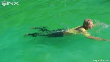 Sexy Blonde Swims And Splashes In Outdoor Pool Screencap 49 on sinx.preview.netperv.com
