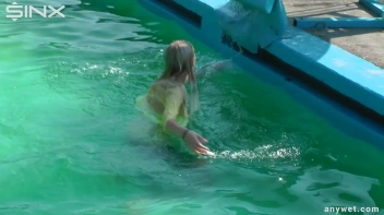 Sexy Blonde Swims And Splashes In Outdoor Pool Screencap 52 on sinx.preview.netperv.com