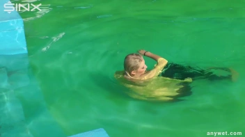 Sexy Blonde Swims And Splashes In Outdoor Pool Screencap 60 on sinx.preview.netperv.com