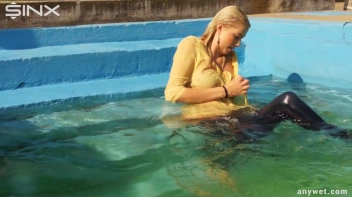 Sexy Blonde Swims And Splashes In Outdoor Pool Screencap 62 on sinx.preview.netperv.com