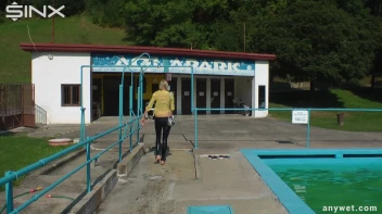 Sexy Blonde Swims And Splashes In Outdoor Pool Screencap 68 on sinx.preview.netperv.com