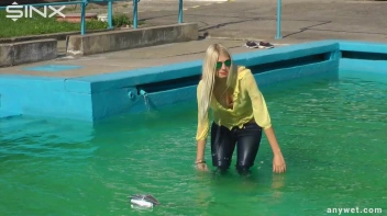 Sexy Blonde Swims And Splashes In Outdoor Pool Screencap 12 on sinx.preview.netperv.com