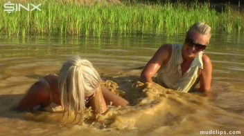 Mud Wrestling Catfighting Babes Dirty Dunking - Cam 2 Screencap 14 on sinx.preview.netperv.com