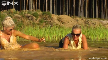 Mud Wrestling Catfighting Babes Dirty Dunking - Cam 2 Screencap 15 on sinx.preview.netperv.com