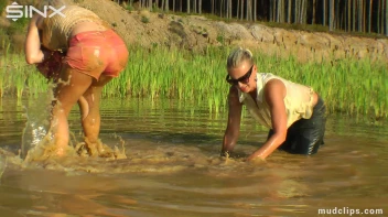 Mud Wrestling Catfighting Babes Dirty Dunking - Cam 2 Screencap 16 on sinx.preview.netperv.com