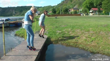 Hot Babes Catfight In Muddy Stream Screencap 7 on sinx.preview.netperv.com