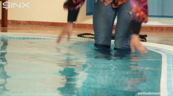 Brunette In Jeans Enters Swimming Pool Clothed Screencap 7 on sinx.preview.netperv.com