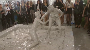 Muddy Wrestling: Satin, Skirts, and Audience Mud Blasted To The Max!  Everyone Gets A Taste! Screencap 98 on sinx.preview.netperv.com