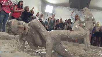 Muddy Wrestling: Satin, Skirts, and Audience Mud Blasted To The Max!  Everyone Gets A Taste! Screencap 105 on sinx.preview.netperv.com