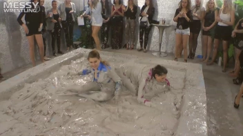 Muddy Wrestling: Satin, Skirts, and Audience Mud Blasted To The Max!  Everyone Gets A Taste! Screencap 11 on sinx.preview.netperv.com