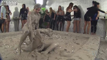 Muddy Wrestling: Satin, Skirts, and Audience Mud Blasted To The Max!  Everyone Gets A Taste! Screencap 57 on sinx.preview.netperv.com