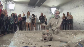 Muddy Wrestling: Satin, Skirts, and Audience Mud Blasted To The Max!  Everyone Gets A Taste! Screencap 68 on sinx.preview.netperv.com