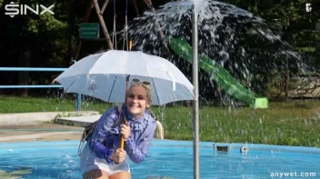 Playful Blonde Gets Drenched Under Water Fountain Screencap 14 on sinx.preview.netperv.com