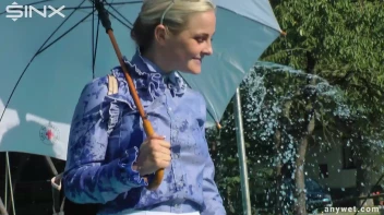 Playful Blonde Gets Drenched Under Water Fountain Screencap 15 on sinx.preview.netperv.com